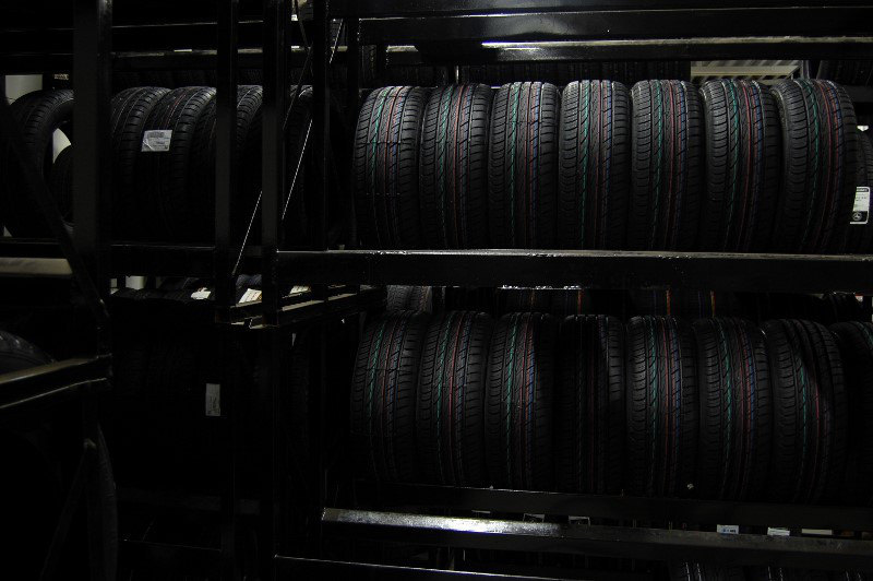 Storing summer tires inside on tire rack