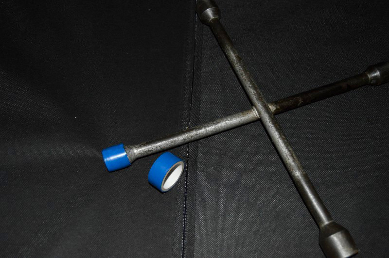 Tape covered lug wrench